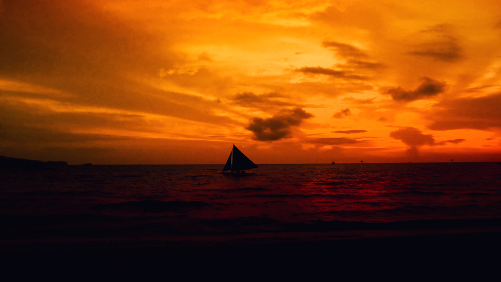 lone sailboat